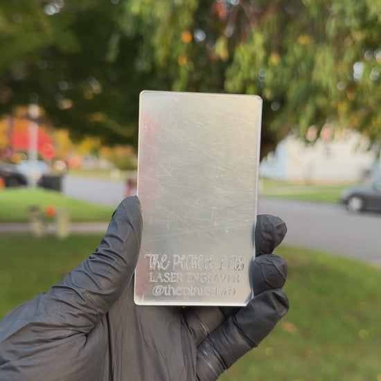 Video of a mirror acrylic business card catching the light